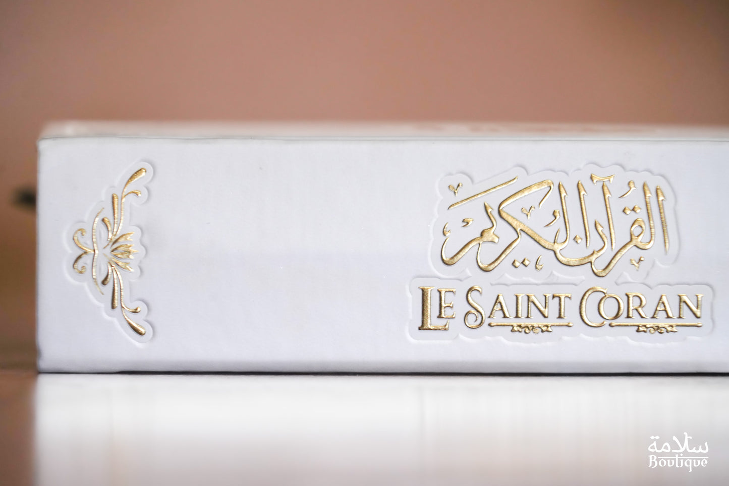 CORAN BLANC ORNEMENT CREUX EN BORDURE - S